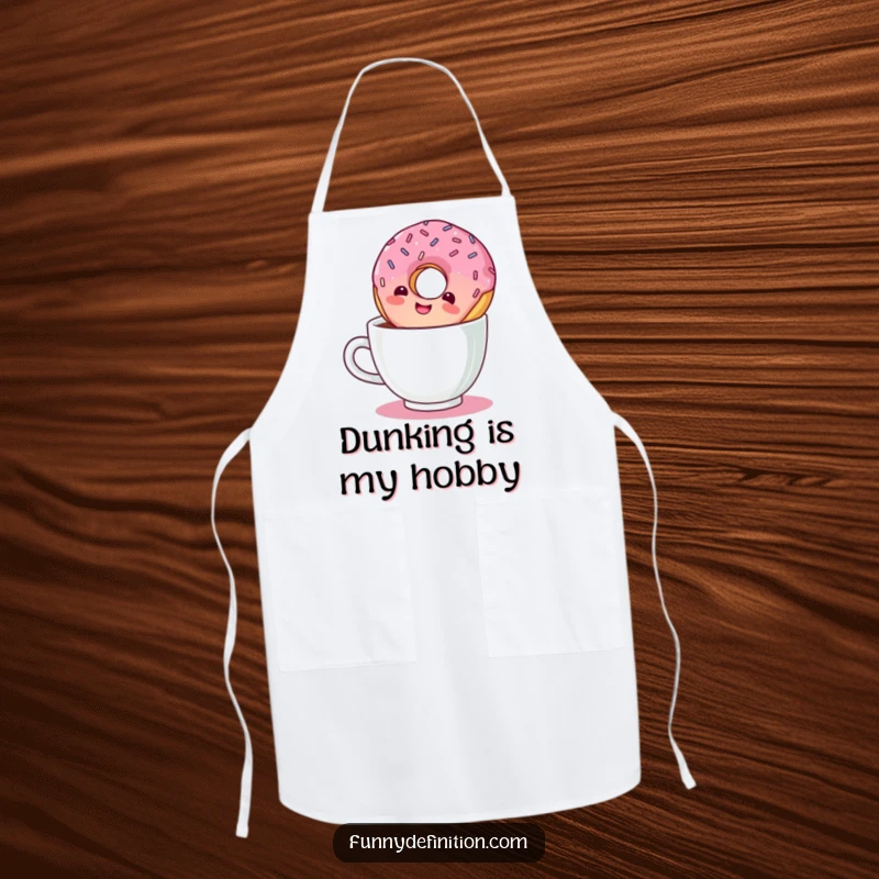 Funny kitchen apron illustrating a giggling donut with sprinkles taking an inverted dive into a coffee cup.