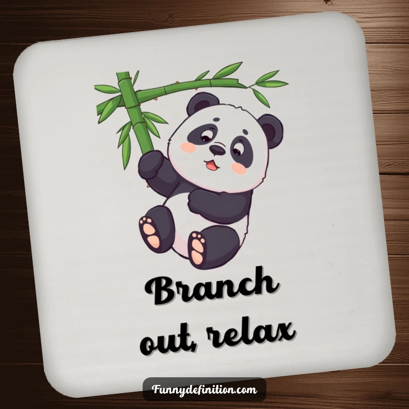 Funny panda character struggling to hang upside down from a bamboo branch on a protective drink coaster.