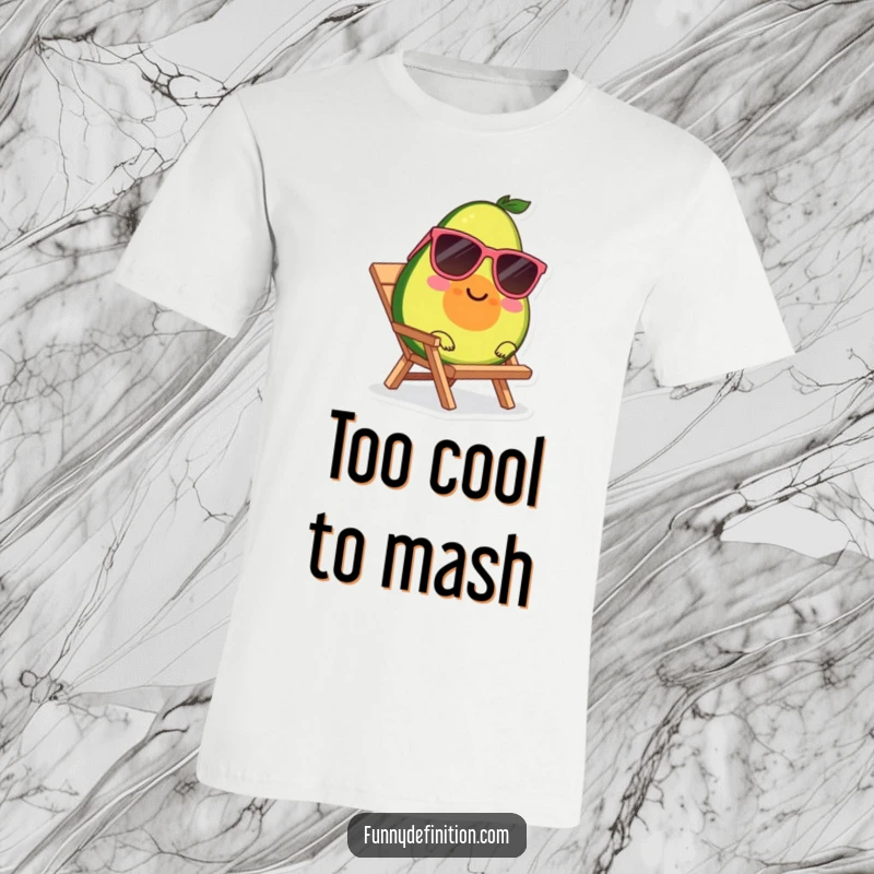 Funny t-shirt graphic of a smiling avocado wearing sunglasses, casually lounging on a miniature beach chair.