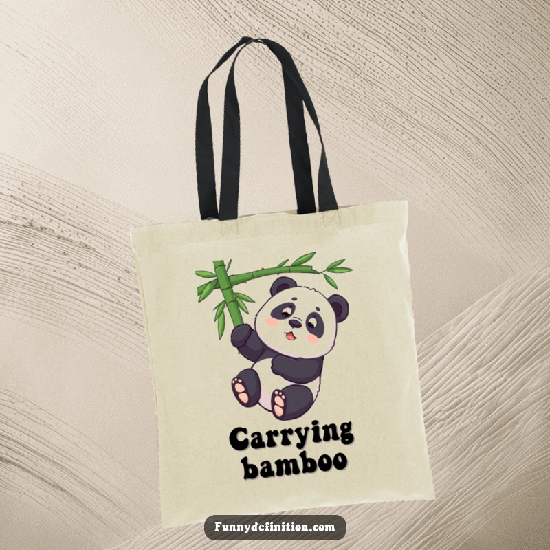 Funny panda character struggling to hang upside down from a bamboo branch on a reusable tote bag.