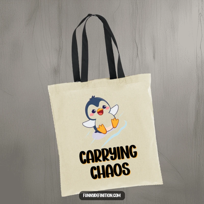 Funny tote bag illustrating a startled penguin character with a comically surprised expression, sliding down an icy slope.