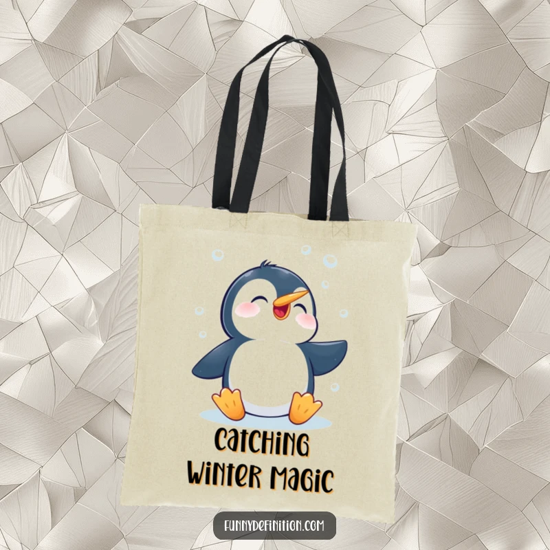 Funny tote bag with a cheerful penguin determinedly trying to catch falling snowflakes in its beak, ready for winter adventures.